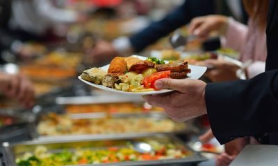 people group catering buffet food indoor in luxury restaurant with meat colorful fruits  and vegetables